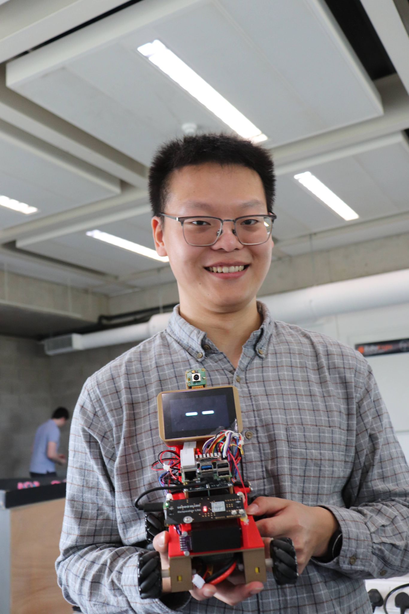 Holding the completed Jarvis robot