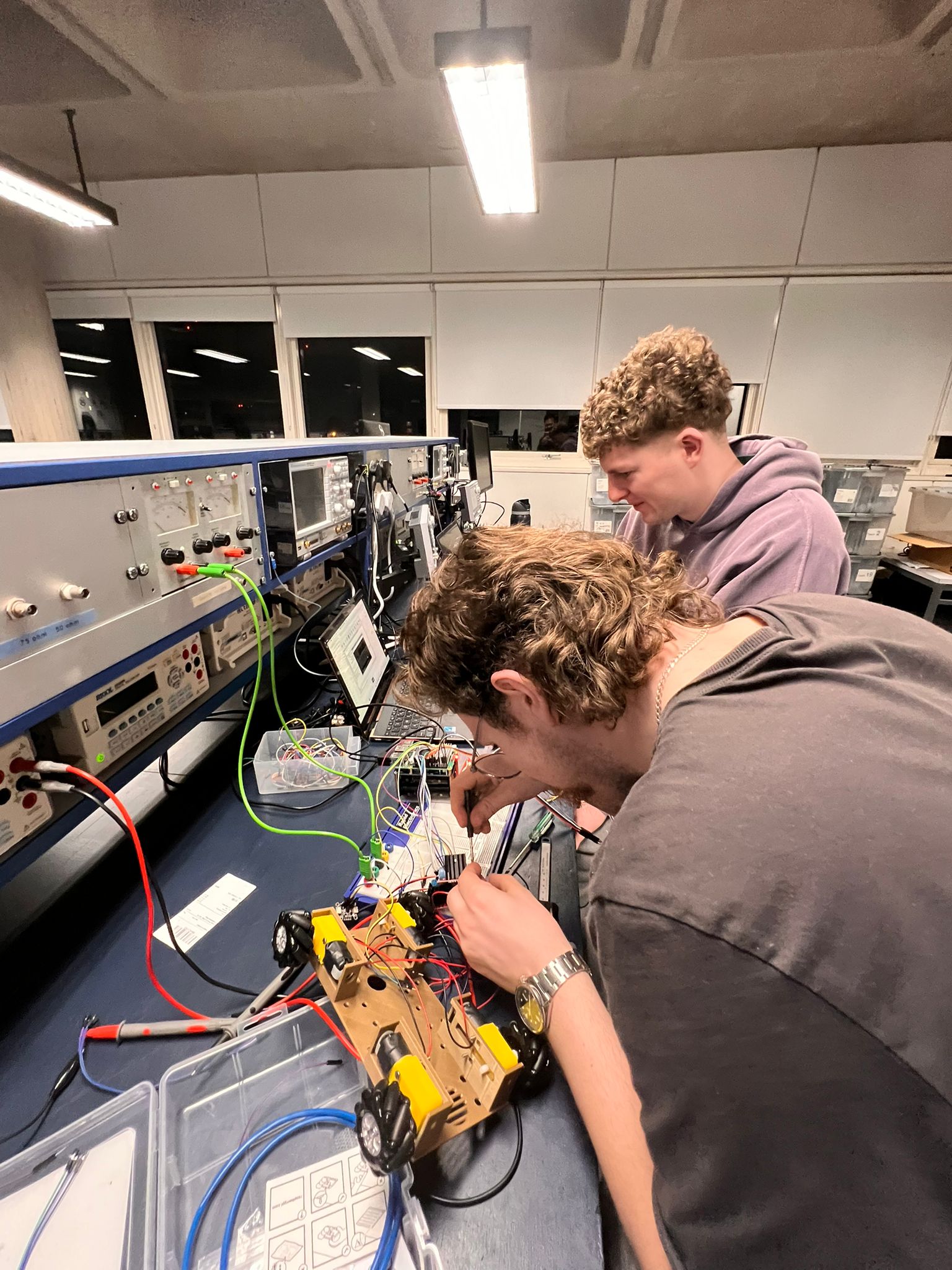 Team working on Jarvis in the electronics lab