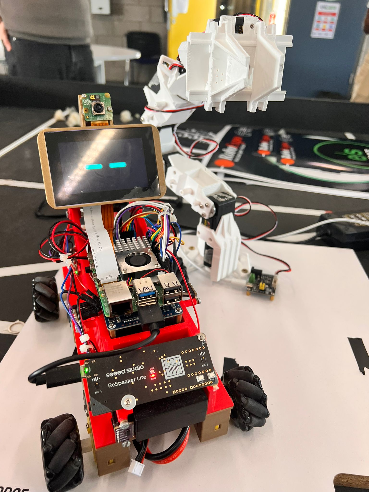 Jarvis robot next to robotic arm project
